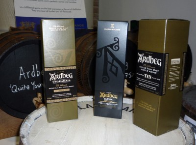 Some bottles of Ardbeg standing around having a chat