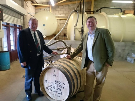 John LS and George S Grant filling their casks